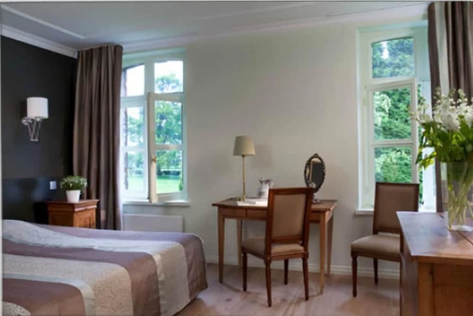 Imagen de la habitación del Hotel Chateau Cocove. Foto 3