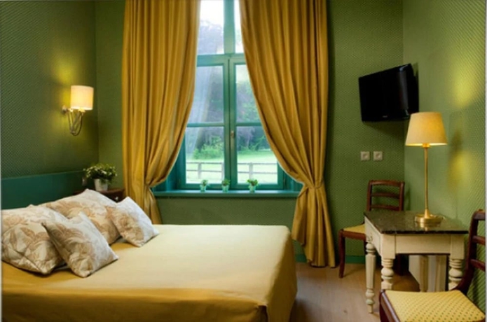 Imagen de la habitación del Hotel Chateau Cocove. Foto 4