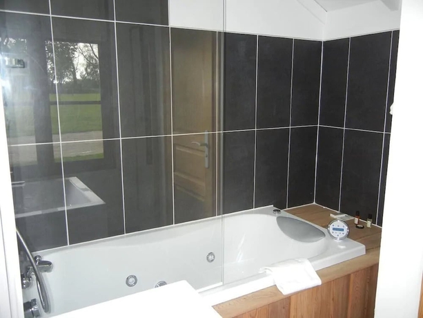 Imagen de la habitación del Hotel Chateau Cocove. Foto 10