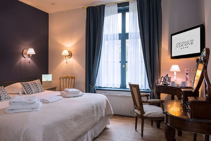 Imagen de la habitación del Hotel Chateau Cocove. Foto 11