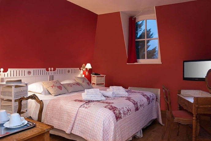 Imagen de la habitación del Hotel Chateau Cocove. Foto 12