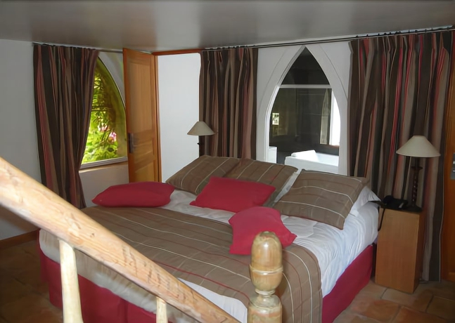 Imagen de la habitación del Hotel Chateau Cocove. Foto 13