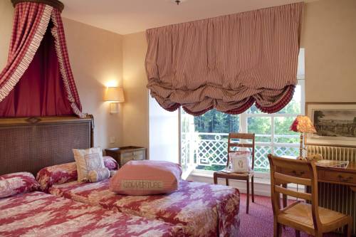 Imagen de la habitación del Hotel Chateau Colbert. Foto 7