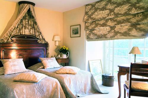 Imagen de la habitación del Hotel Chateau Colbert. Foto 19