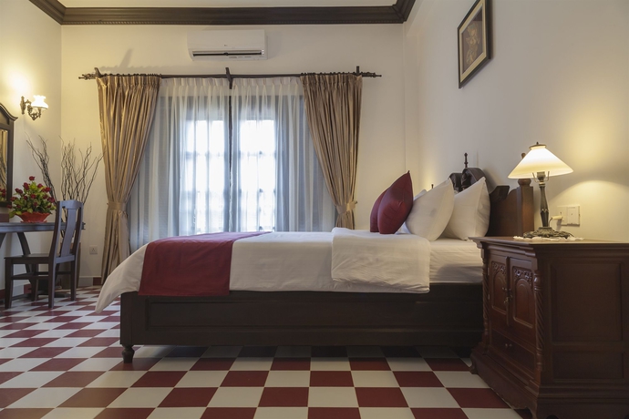 Imagen de la habitación del Hotel Chateau D'angkor La Residence. Foto 8
