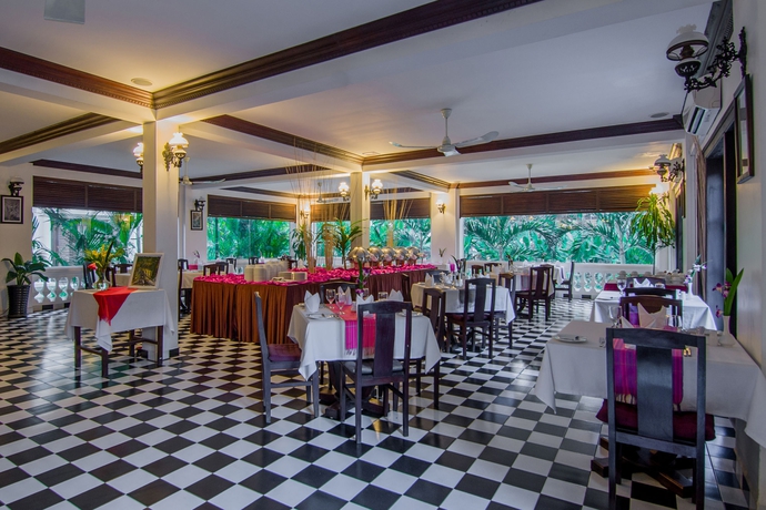 Imagen del bar/restaurante del Hotel Chateau D'angkor La Residence. Foto 5