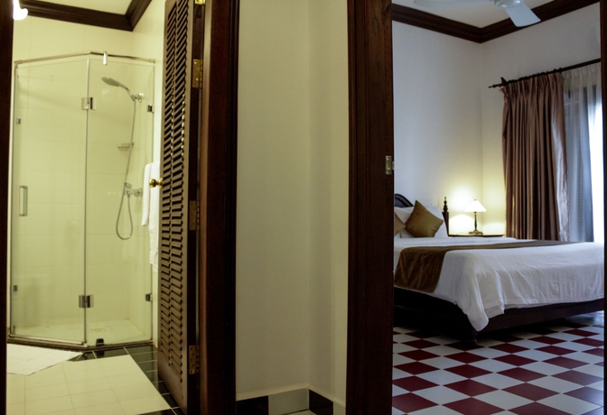 Imagen de la habitación del Hotel Chateau D'angkor La Residence. Foto 10