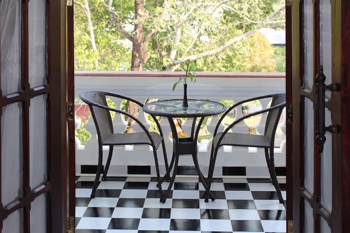 Imagen de la habitación del Hotel Chateau D'angkor La Residence. Foto 13