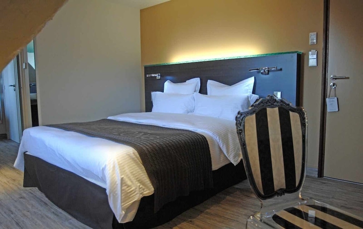 Imagen de la habitación del Hotel Chateau De Champlong. Foto 8