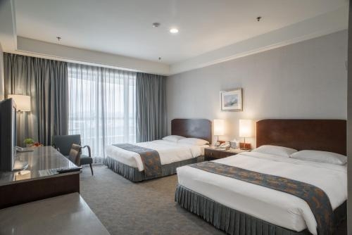 Imagen de la habitación del Hotel Chateau De Chine Taoyuan. Foto 7