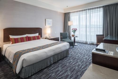 Imagen de la habitación del Hotel Chateau De Chine Taoyuan. Foto 8