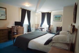 Imagen de la habitación del Hotel Chateau De La Motte Fénelon. Foto 2