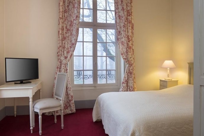 Imagen de la habitación del Hotel Chateau De Lhermitage. Foto 7
