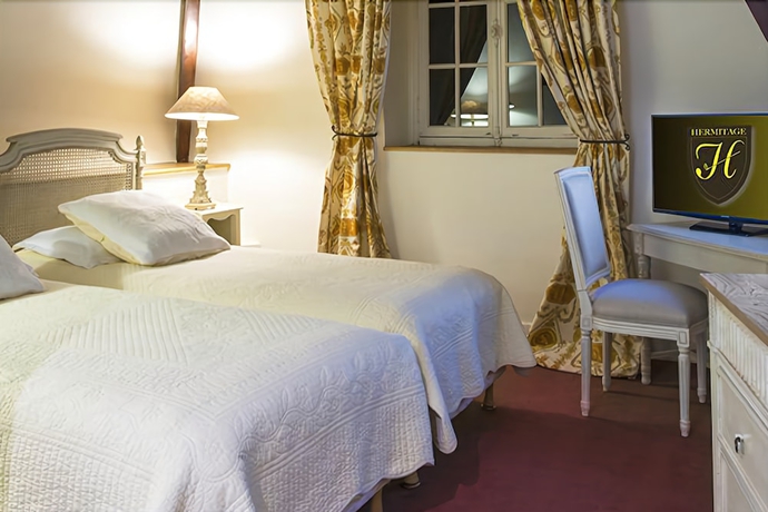 Imagen de la habitación del Hotel Chateau De Lhermitage. Foto 8