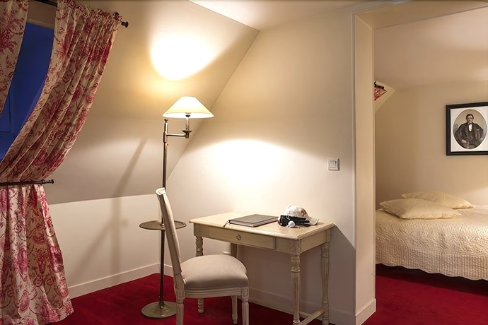 Imagen de la habitación del Hotel Chateau De Lhermitage. Foto 10