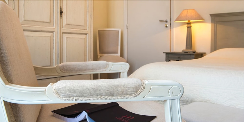 Imagen de la habitación del Hotel Chateau De Lhermitage. Foto 18