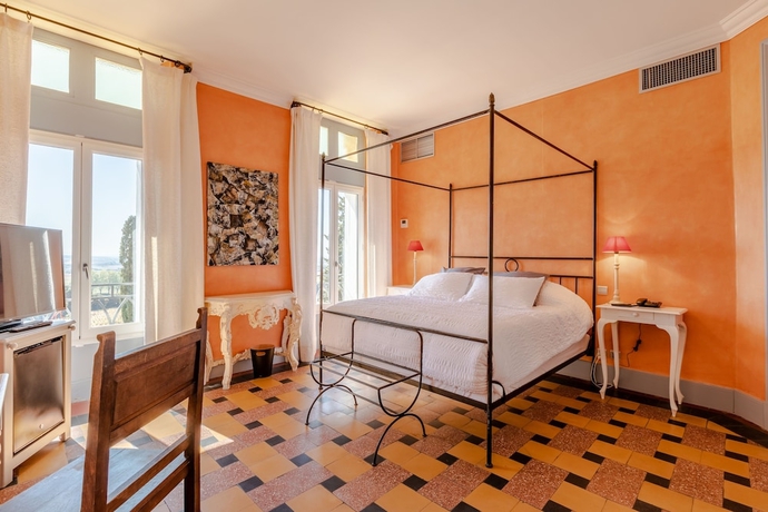 Imagen de la habitación del Hotel Chateau Des Fines Roches. Foto 5