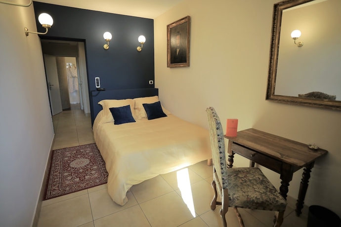 Imagen de la habitación del Hotel Chateau Des Fines Roches. Foto 6