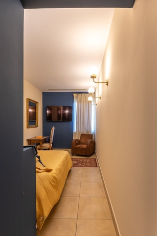 Imagen de la habitación del Hotel Chateau Des Fines Roches. Foto 7