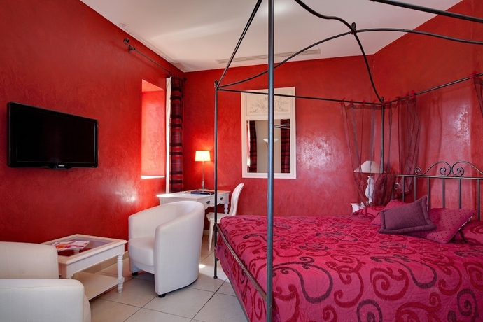 Imagen de la habitación del Hotel Chateau Des Fines Roches. Foto 9