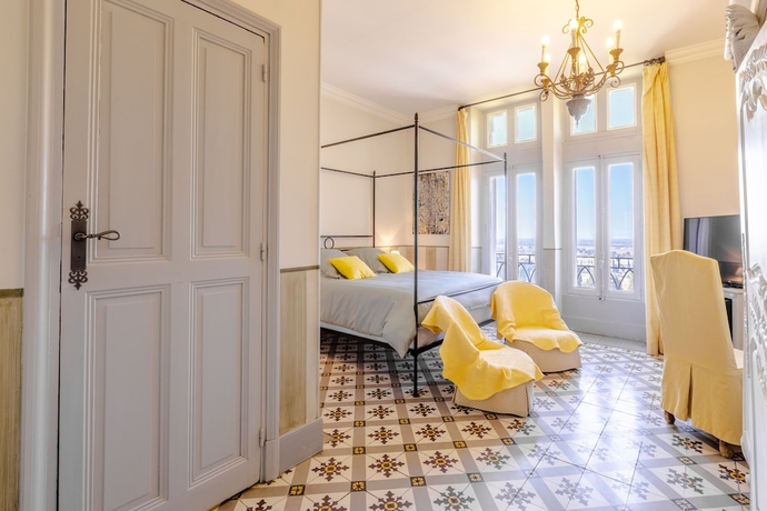 Imagen de la habitación del Hotel Chateau Des Fines Roches. Foto 14