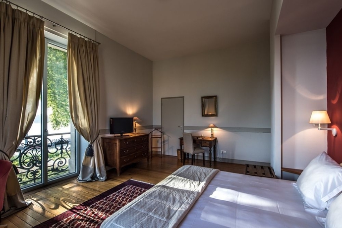 Imagen de la habitación del Hotel Chateau Grattequina. Foto 2