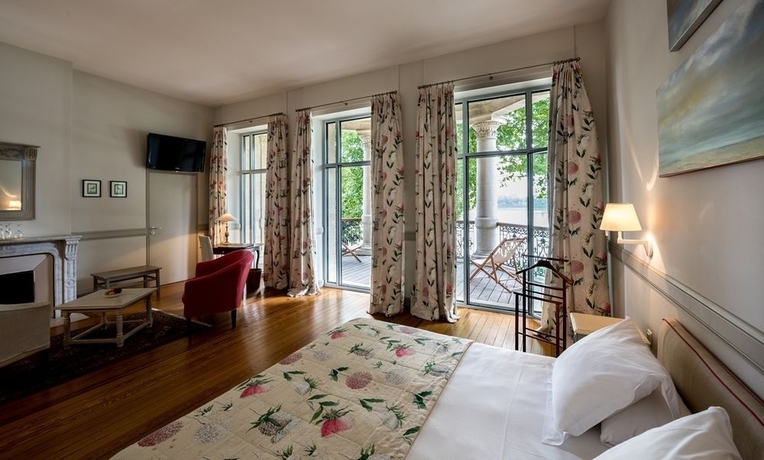 Imagen de la habitación del Hotel Chateau Grattequina. Foto 4