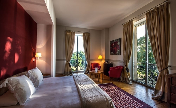 Imagen de la habitación del Hotel Chateau Grattequina. Foto 7