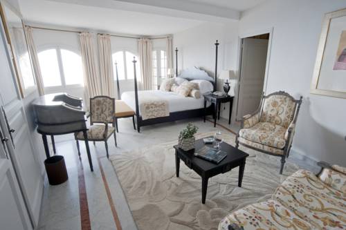 Imagen de la habitación del Hotel Chateau La Chèvre D'or. Foto 3