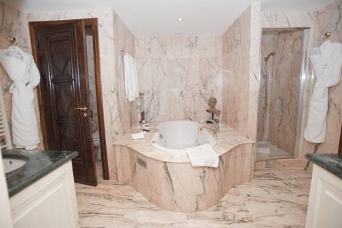 Imagen de la habitación del Hotel Chateau La Chèvre D'or. Foto 4