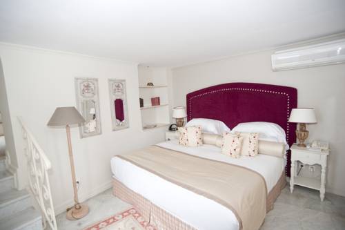 Imagen de la habitación del Hotel Chateau La Chèvre D'or. Foto 6