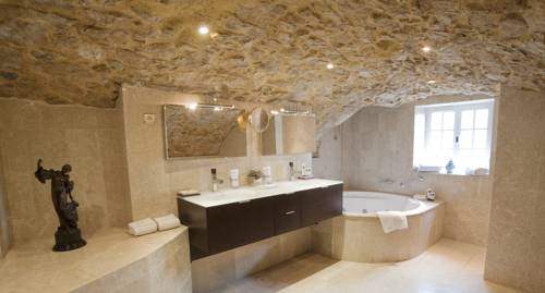 Imagen de la habitación del Hotel Chateau La Chèvre D'or. Foto 7