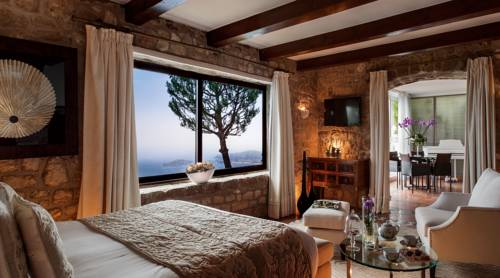 Imagen de la habitación del Hotel Chateau La Chèvre D'or. Foto 9