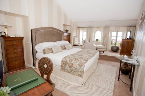 Imagen de la habitación del Hotel Chateau La Chèvre D'or. Foto 13