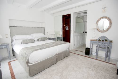 Imagen de la habitación del Hotel Chateau La Chèvre D'or. Foto 14