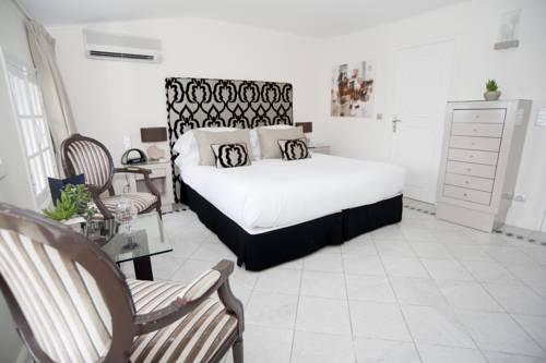 Imagen de la habitación del Hotel Chateau La Chèvre D'or. Foto 15