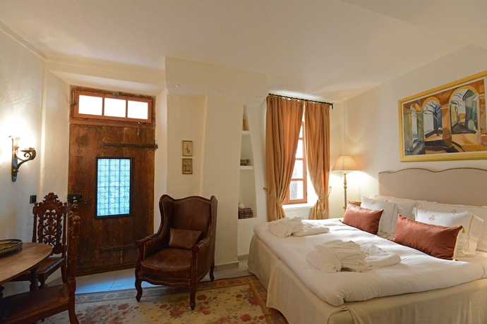 Imagen de la habitación del Hotel Chateau Le Cagnard. Foto 14