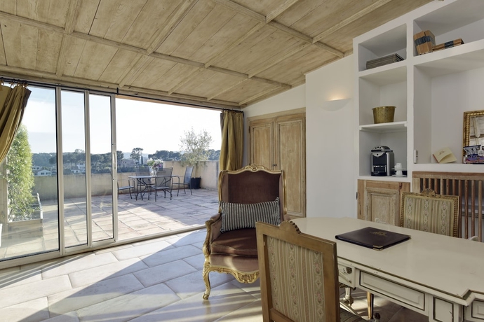 Imagen de la habitación del Hotel Chateau Le Cagnard. Foto 17