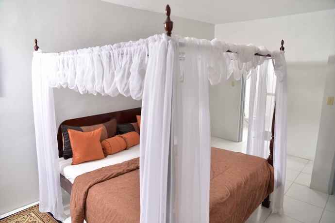 Imagen de la habitación del Hotel Chateau Margarite. Foto 8
