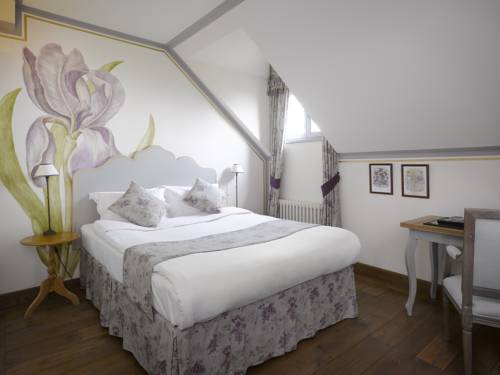 Imagen de la habitación del Hotel Chateau Mcely. Foto 11