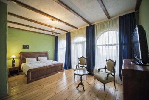 Imagen de la habitación del Hotel Chateau Mere. Foto 9