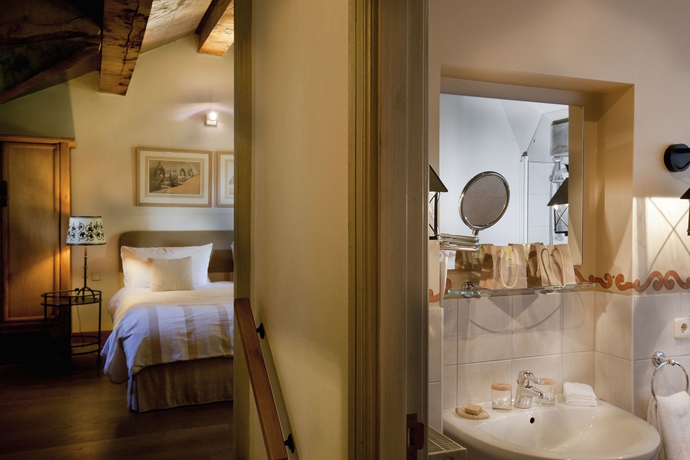 Imagen de la habitación del Hotel Chateau St Gerlach. Foto 7