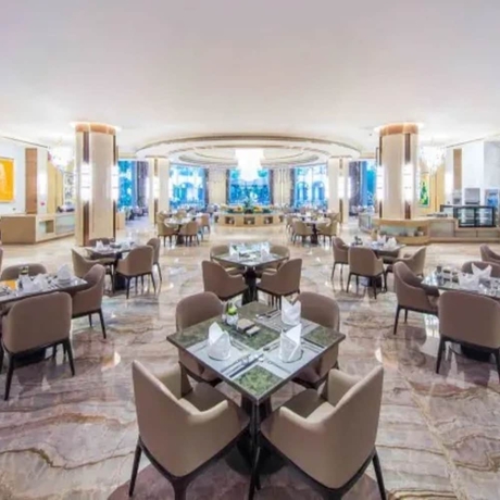 Imagen del bar/restaurante del Hotel Chateau Star River Hotel Shan Wei. Foto 3