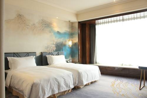 Imagen de la habitación del Hotel Chateau Star River Shaanxi. Foto 4