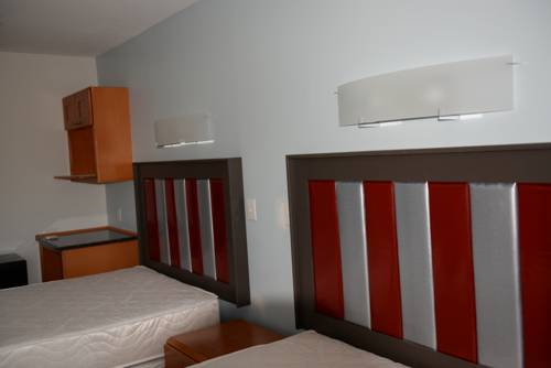 Imagen de la habitación del Hotel Chateau Suites. Foto 2