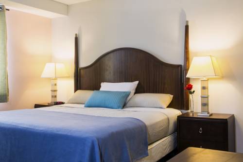 Imagen de la habitación del Hotel Chateau Suites. Foto 6