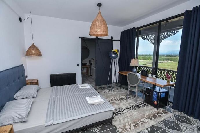 Imagen de la habitación del Hotel Chateau Vartsikhe. Foto 17