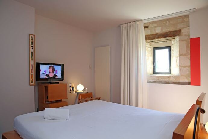 Imagen de la habitación del Hotel Chateau de Salettes. Foto 11