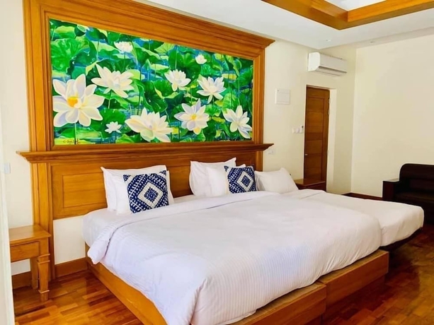 Imagen de la habitación del Hotel Chaung Tha Lodge. Foto 5