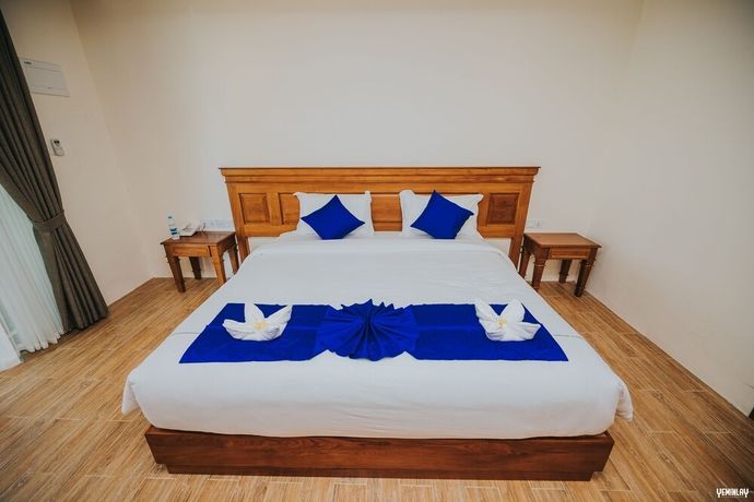 Imagen de la habitación del Hotel Chaung Tha Lodge. Foto 7